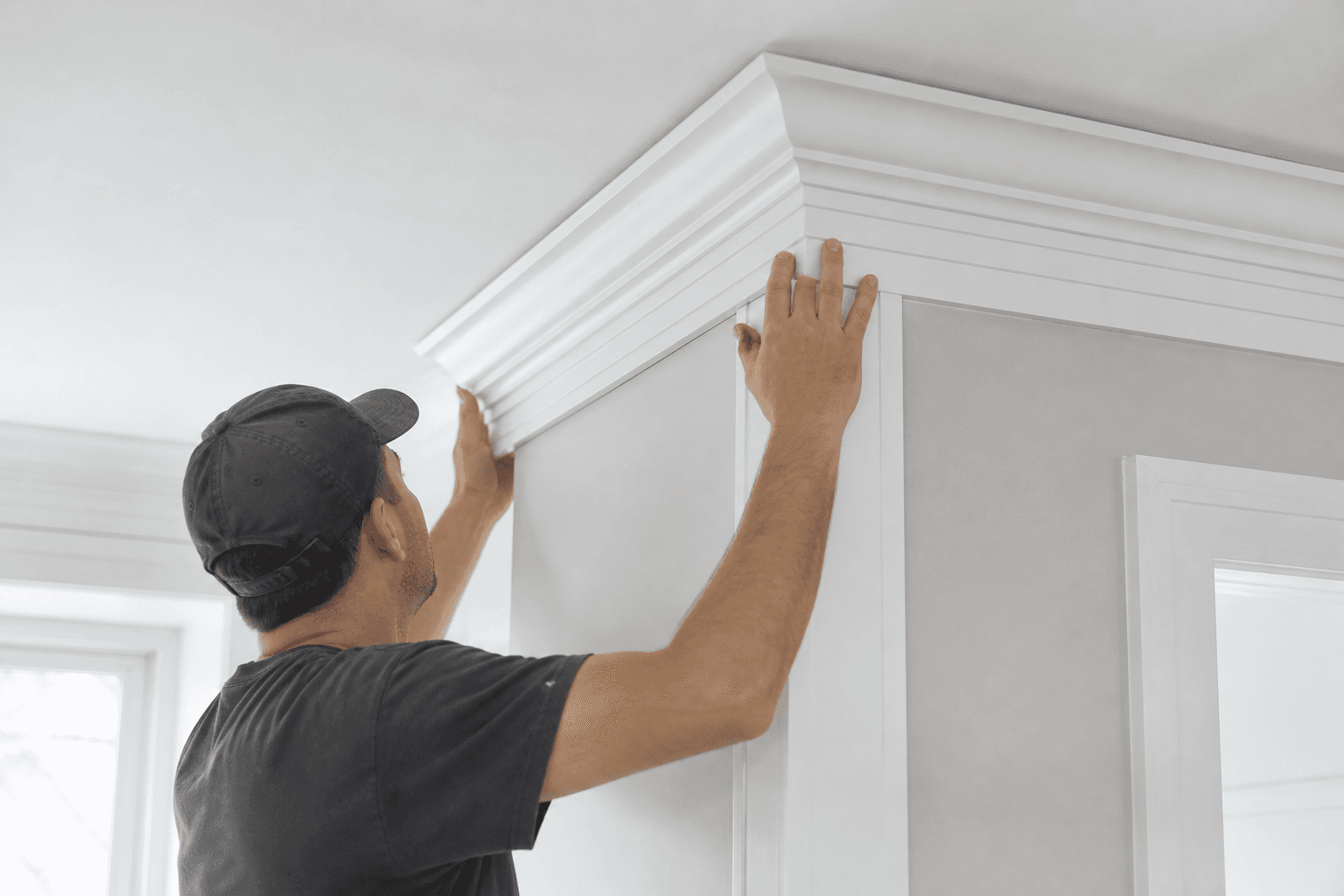 Detailed crown molding and trim in a bright interior